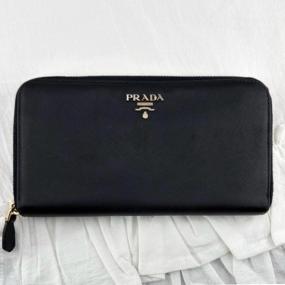 AUTHENTIC Prada wallet. Black with pink interior. - Picture 1 of 16